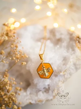 Amber hexagon and bee pendant necklace